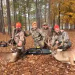 Bill Busbice, Matt Busbice, Lance Ortemond and Ryan Busbice pose with their kills after a successful hunt.